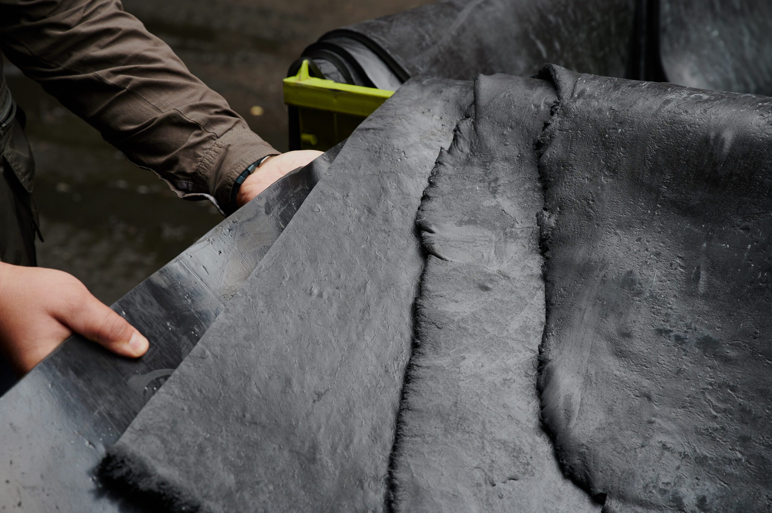 Rubber sheets used in manufacturing Stacks of high-quality rubber sheets ready for rubber manufacturing use